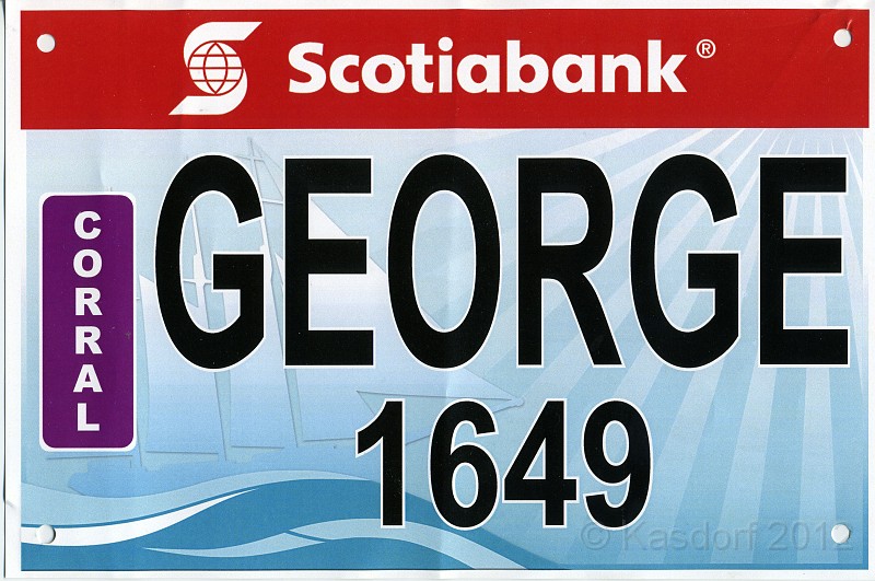 2012 Toronto WM 076.jpg - The personalized bib. Sorta nice, lots of people yelling "Go George". Next year I think I will ask for "Fish"